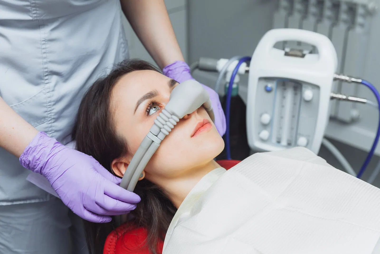 Relaxed patient resting comfortably in the dental chair
